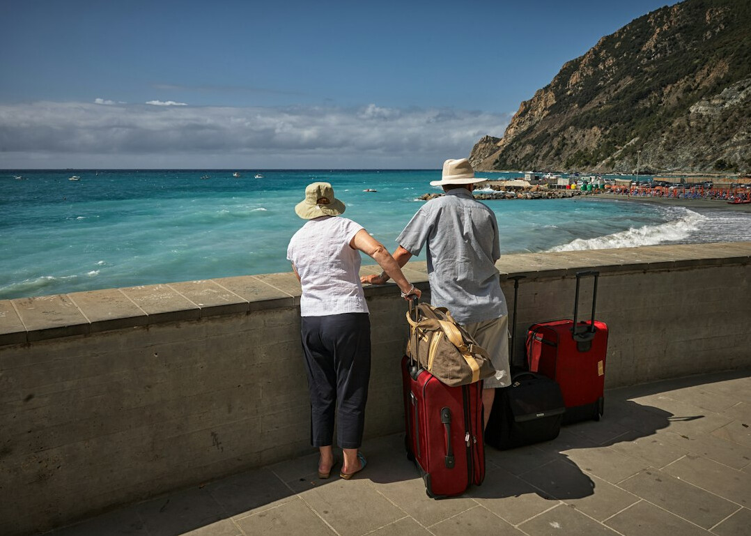 senior couple planning budget trip
