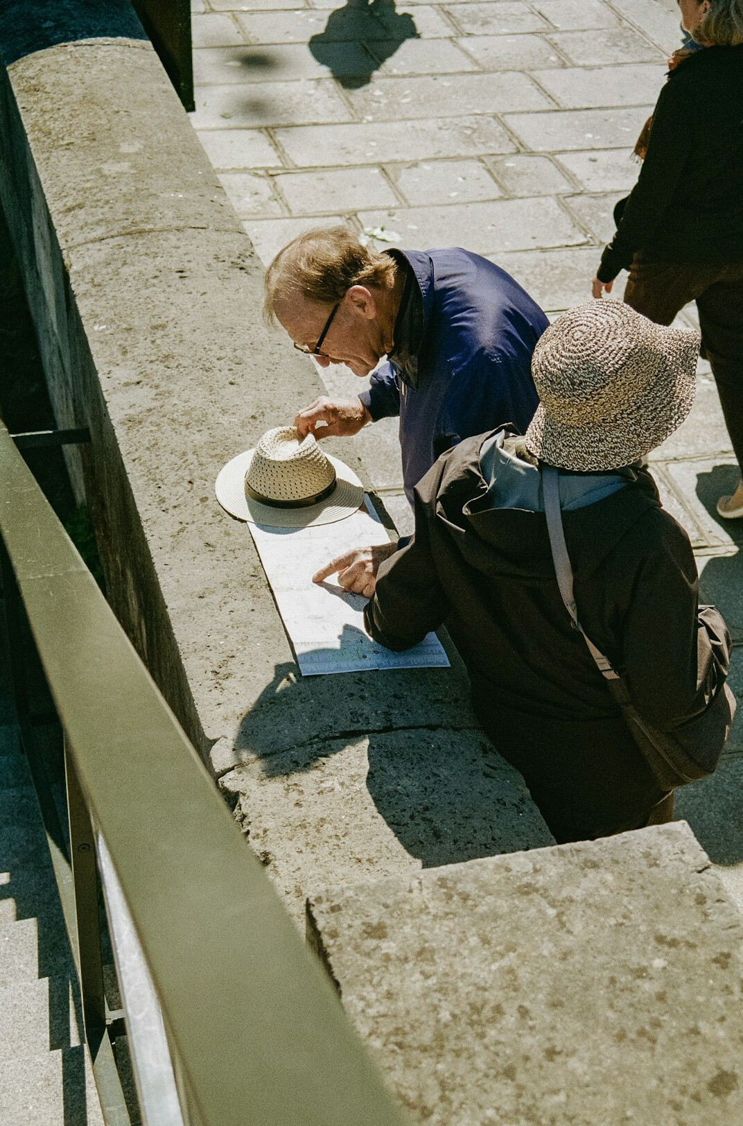 senior woman reading map