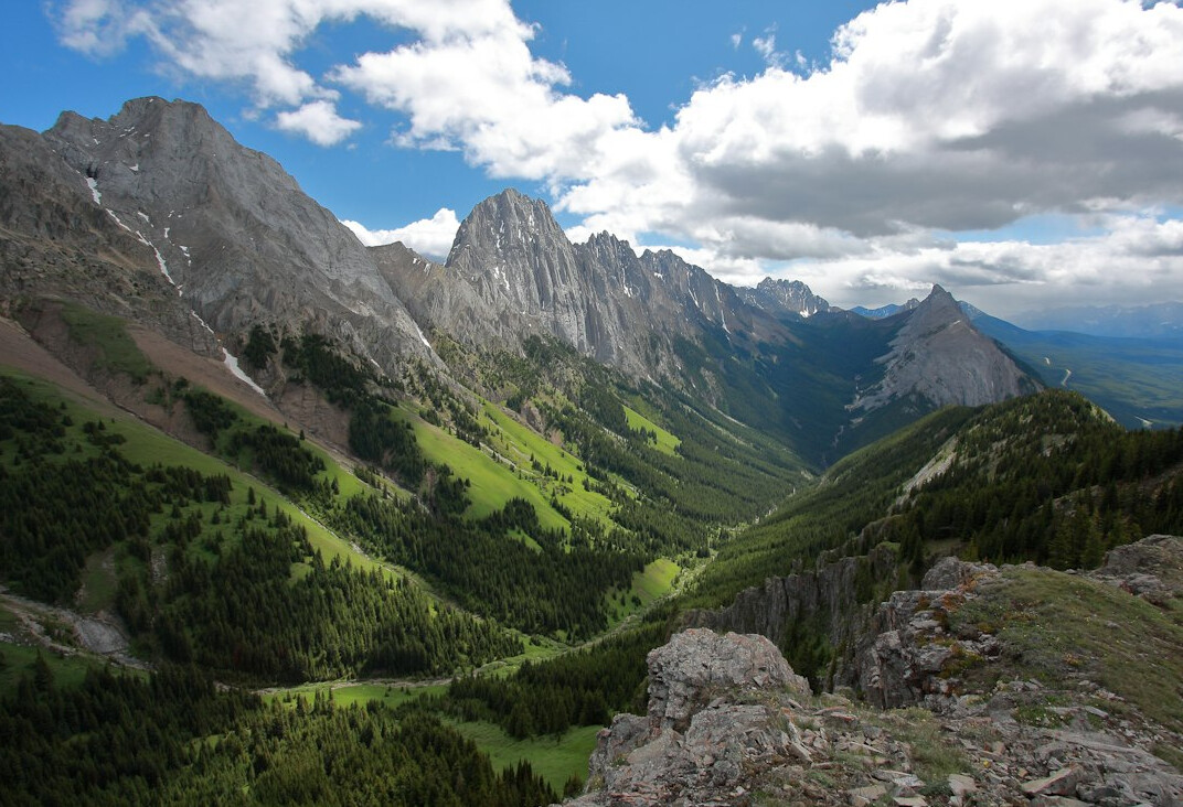 Majestic mountain peaks with green valley